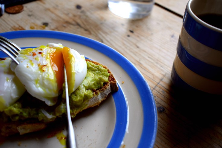 A perfect poached egg should have a firm, set white and a beautiful runny yolk - easy poaching method from Crumbs and Roses.